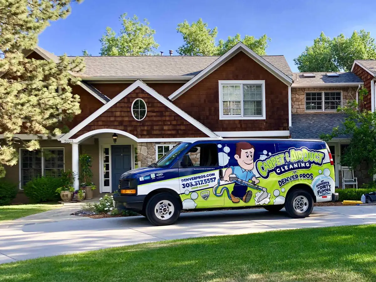 Denver Pros cleaning van at a home in Aurora, CO
